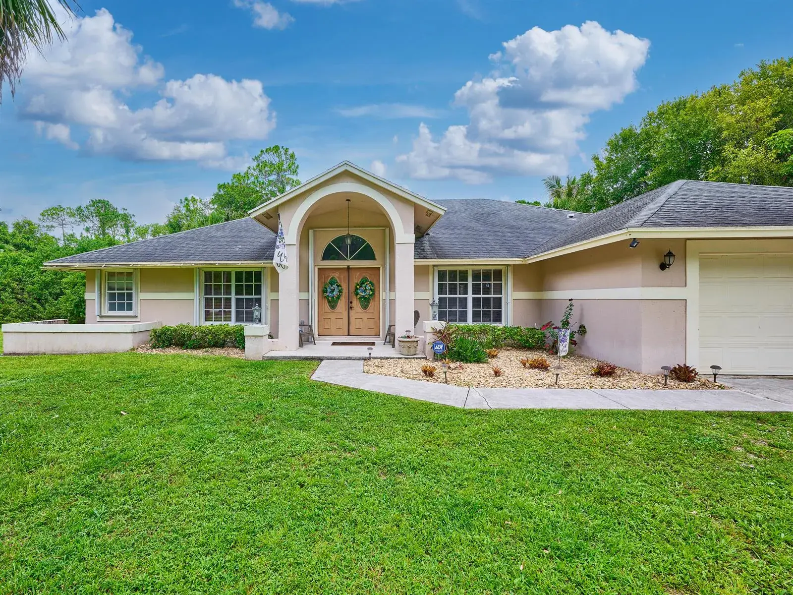 4 bedroom 2 bath for sale at 16405 90th Street N, FL 33470