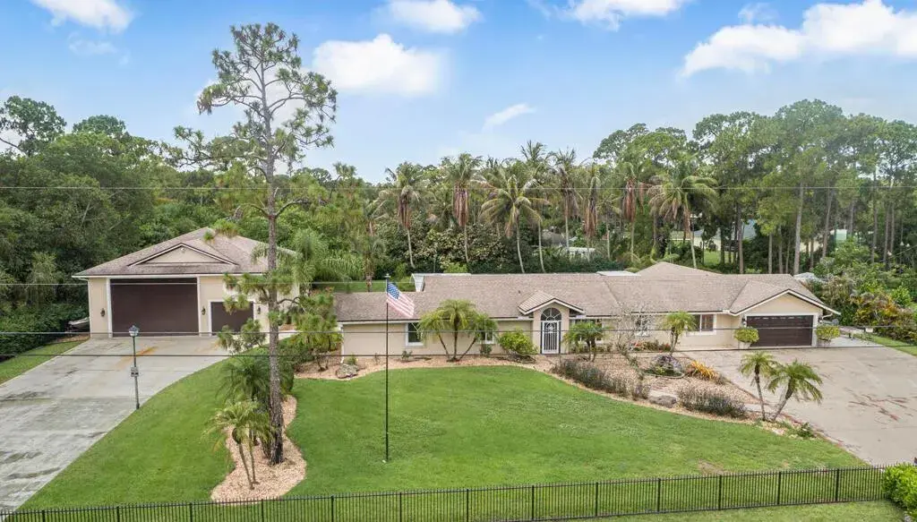 5 bedroom 3 bath for sale at 13676 N 85th Road N, West Palm Beach FL 33412