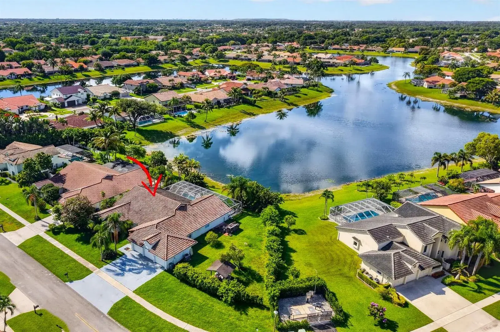 4 bedroom 3 bath for sale at 11845 Island Lakes Lane, Boca Raton FL 33498