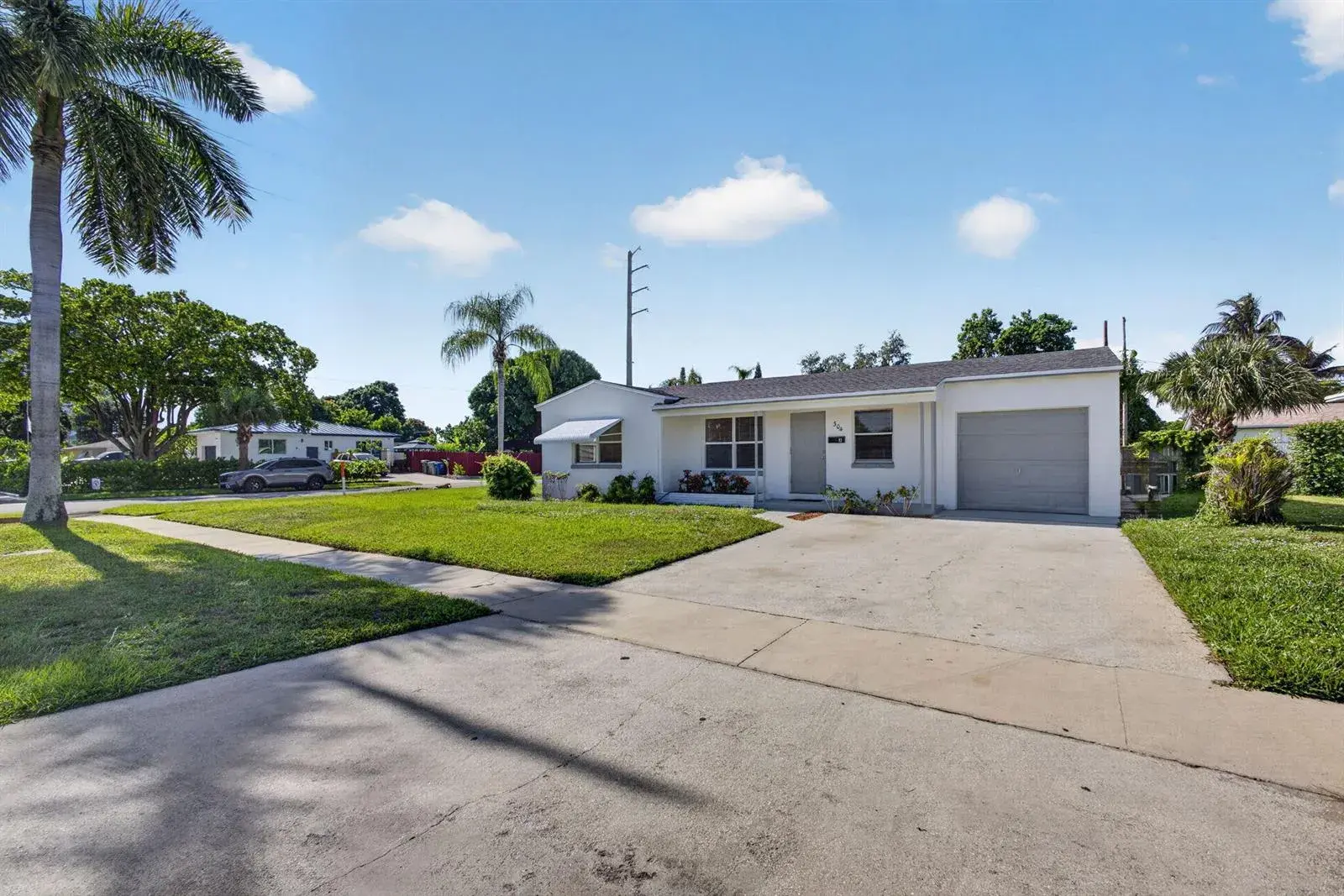 4 bedroom 3 bath Residential for sale at 304 Cypress Drive, Lake Park FL 33403