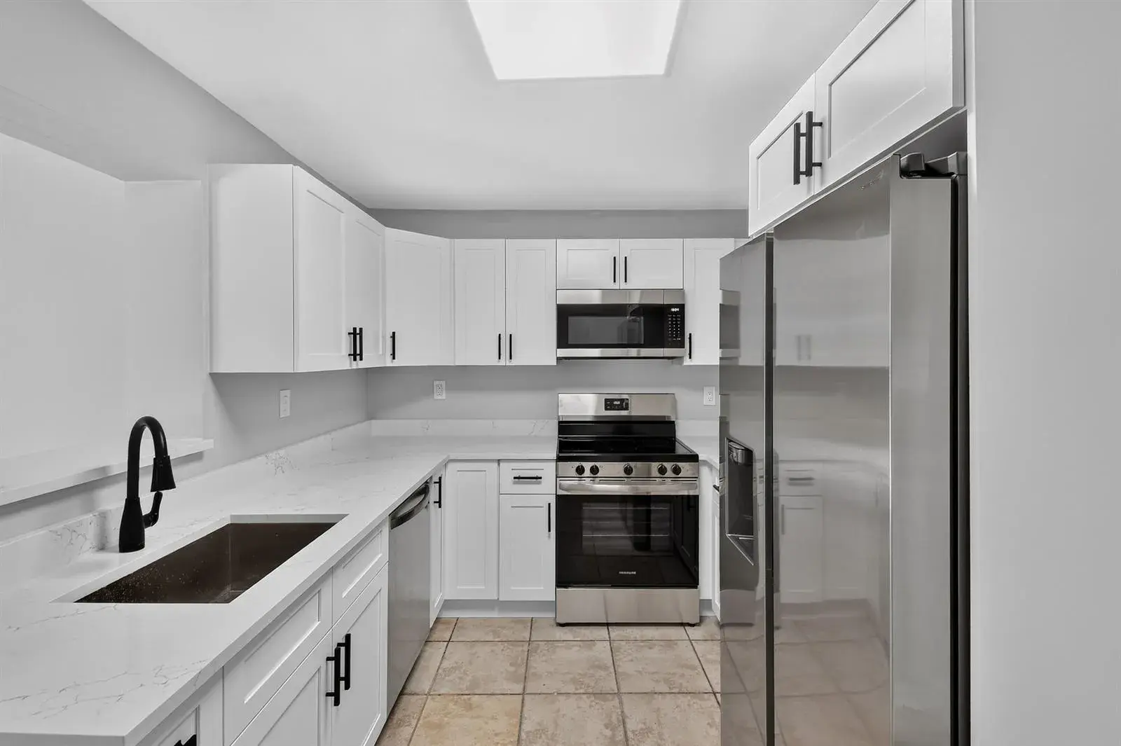 4 bedroom 2 bath for sale at 1037 W 28TH Street, Riviera Beach FL 33404