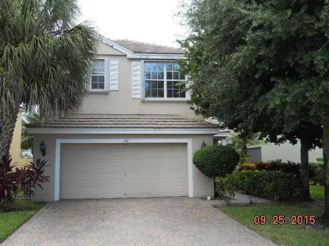5 bedroom 2 bath Residential for sale at 147 Kensington Way, Royal Palm Beach FL 33414