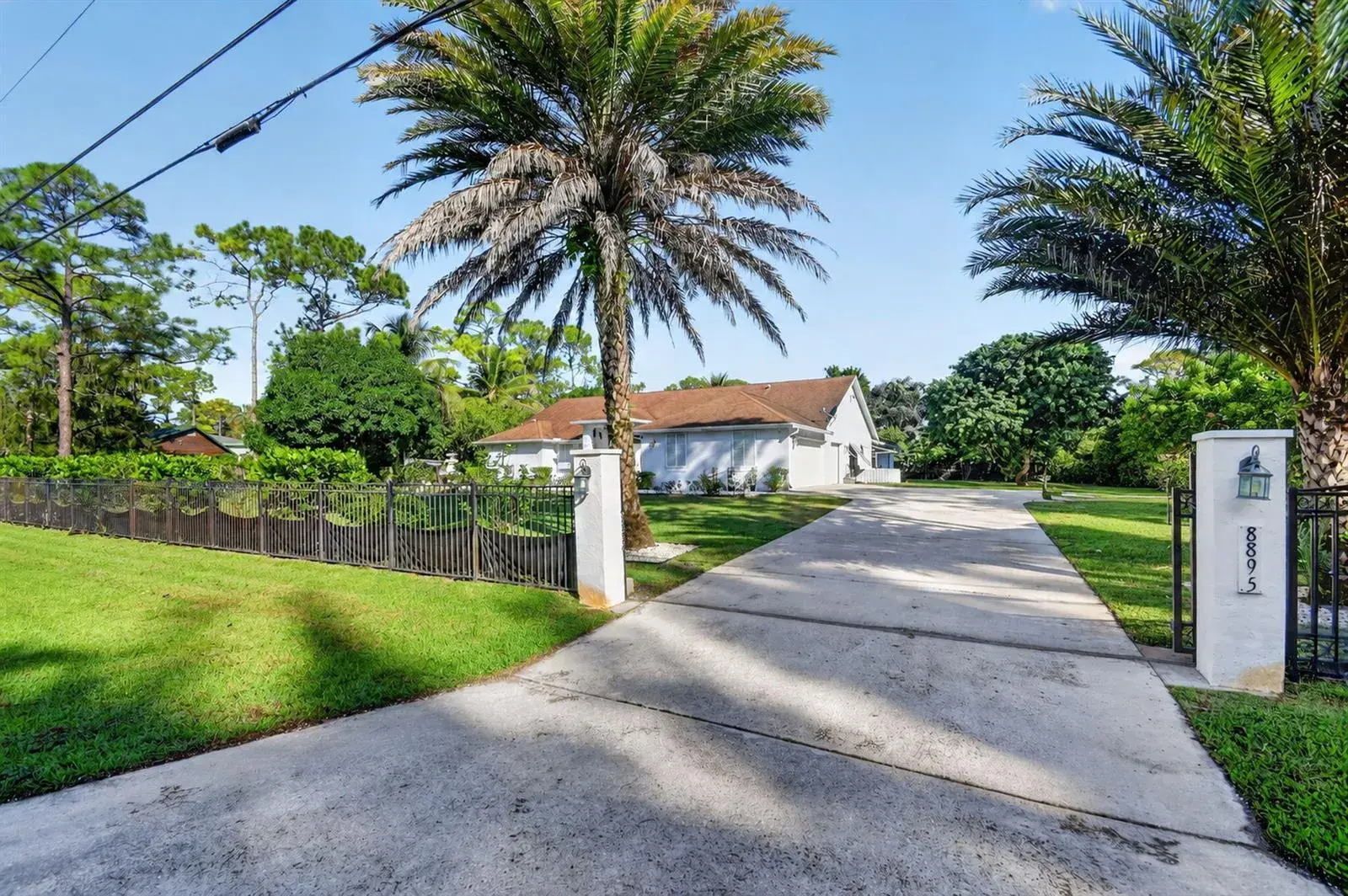 5 bedroom 3 bath Residential for sale at 8895 Palomino Drive, Lake Worth FL 33467