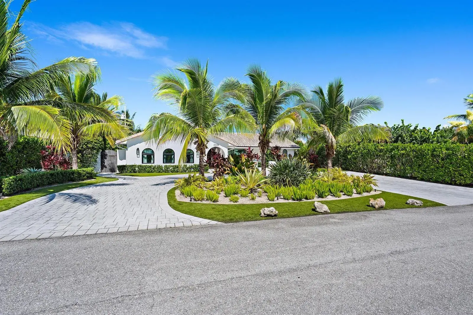 4 bedroom 3 bath Residential for sale at 3335 Cove Road, Jupiter FL 33469