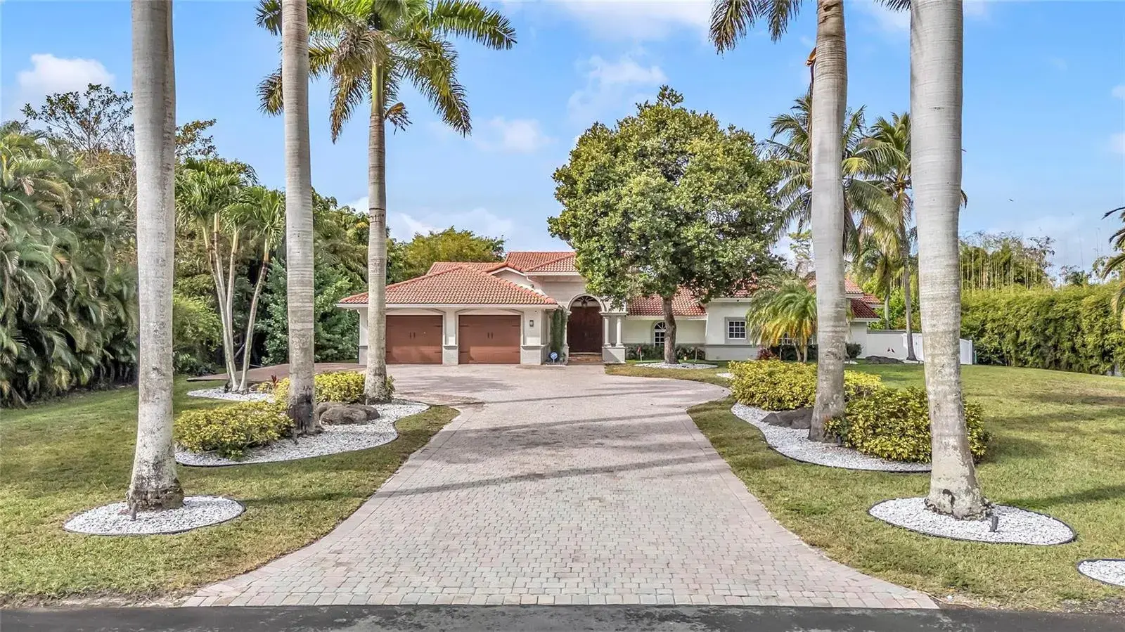 7 bedroom 4 bath Residential for sale at 5963 NW 75th Way, Parkland FL 33067