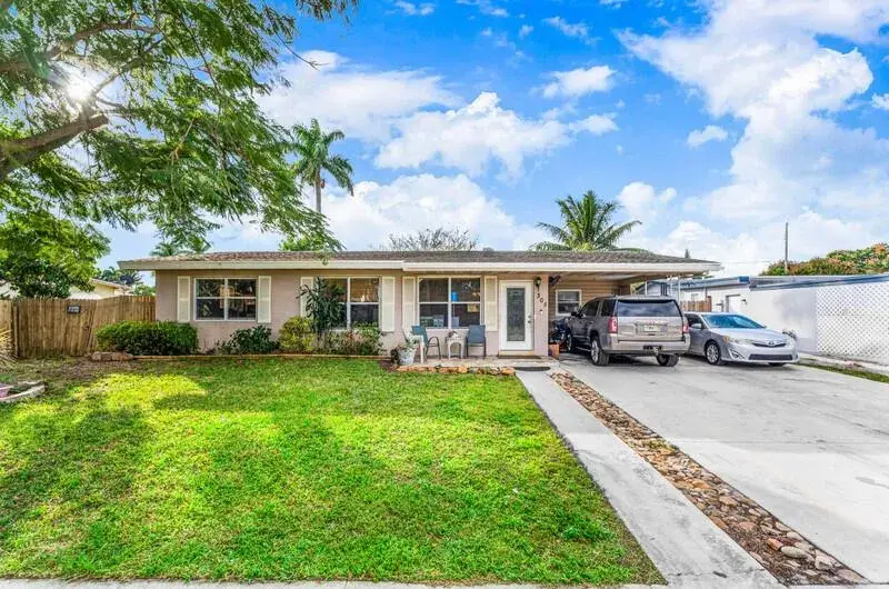 4 bedroom 2 bath Residential for sale at 305 Henthorne Drive, Palm Springs FL 33461