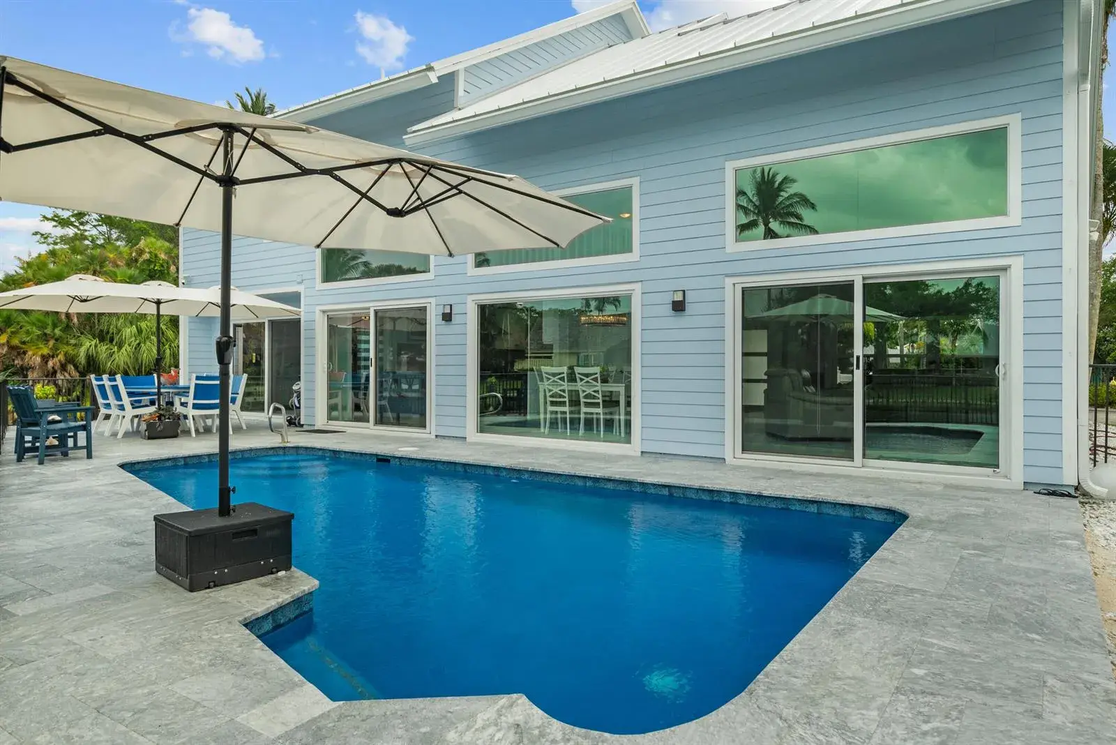 4 bedroom 2 bath Residential for sale at 9029 SE Breeze Way, Hobe Sound FL 33455
