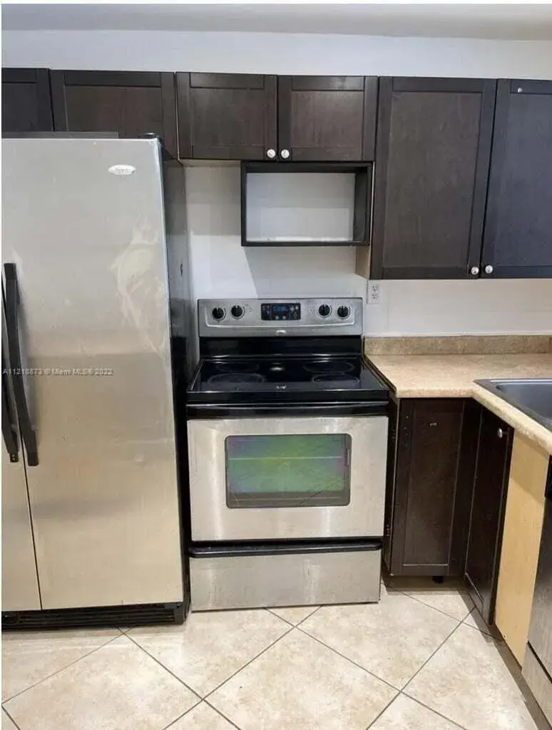 484 NW 165th St Road # 211, Miami FL 33169