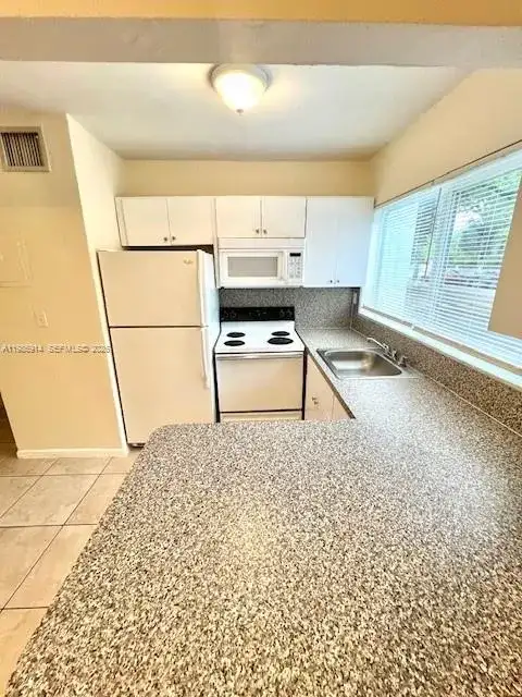 7626 NE 6th Ct # 1, Miami FL 33138 photo 4