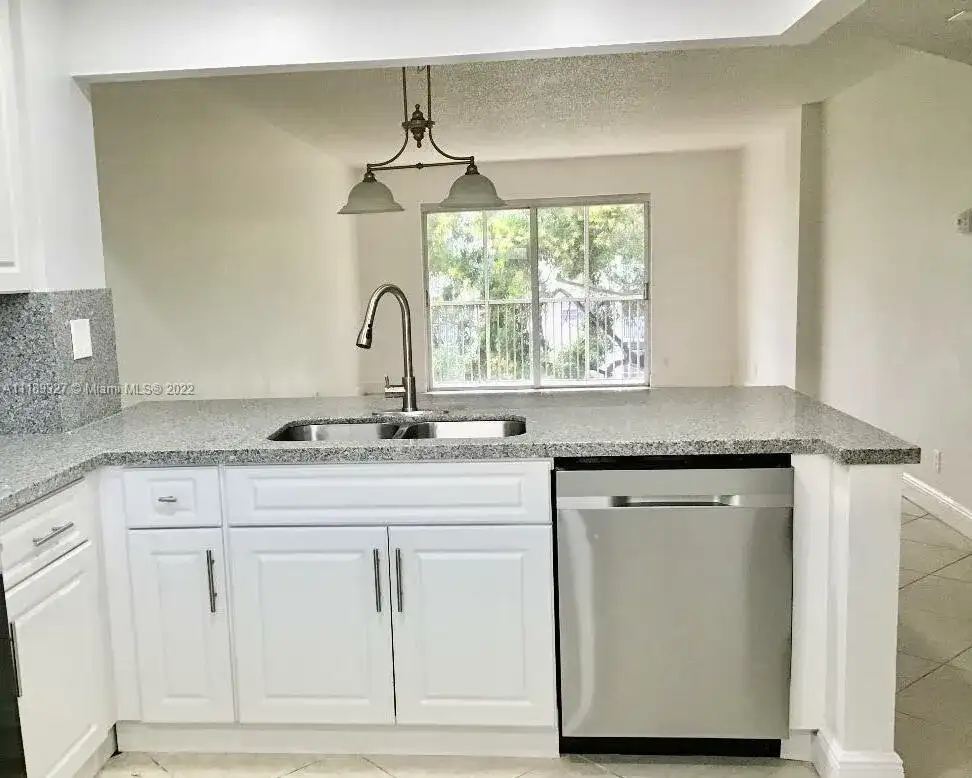 1100 NW 87th Ave # 304, Coral Springs FL 33071 photo 2