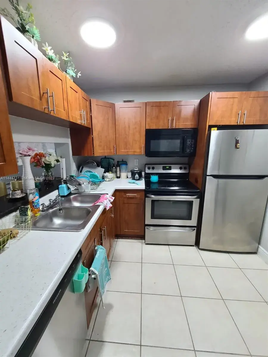 496 NW 165th St Rd # D112, Miami FL 33169