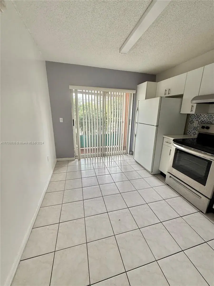 4677 NW 9th St # 211, Miami FL 33126