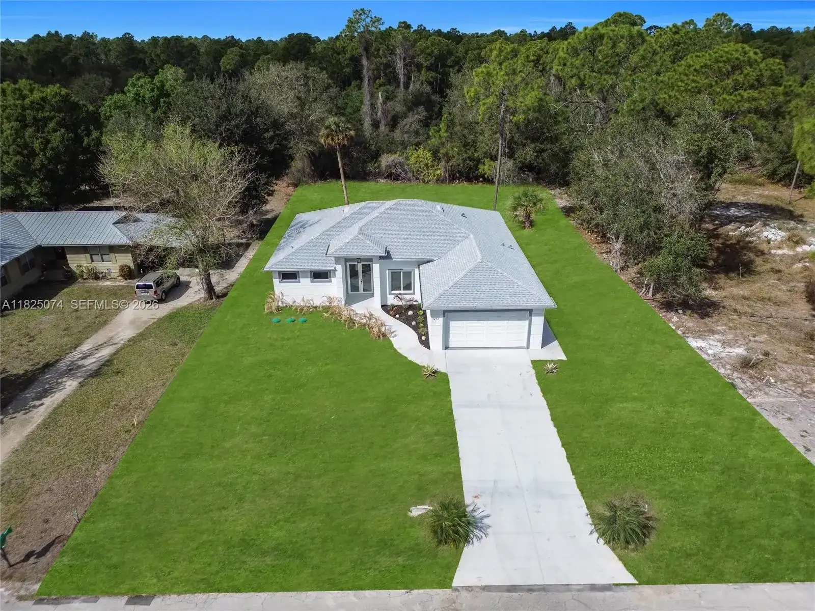 1215 Fitch Ave, Lehigh Acres FL 33972 photo 2