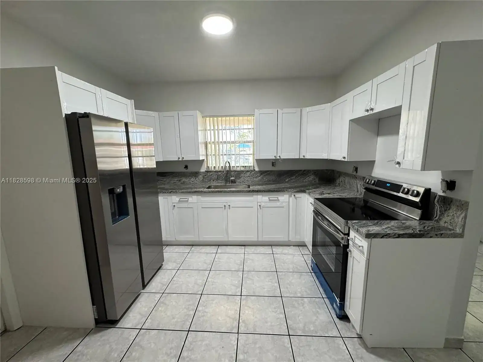 613 NW 58th Ave # 613, Miami FL 33126 photo 2