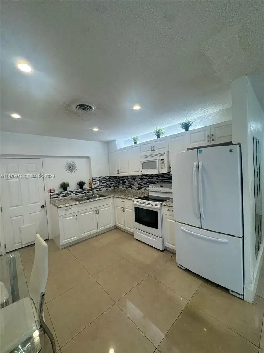 4808 NW 27th Ter, Tamarac FL 33309 photo 3