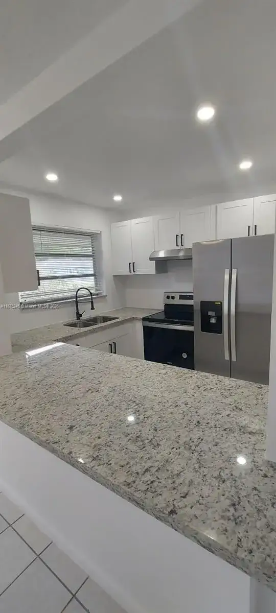3033 NW 43rd Ave # 108, Lauderdale Lakes FL 33313 photo 2