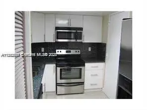 301 Golden Isles Dr # 211, Hallandale Beach FL 33009
