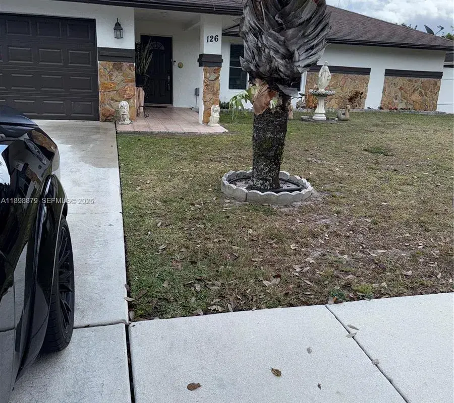 126 Sunflower Cir, Royal Palm Beach FL 33411