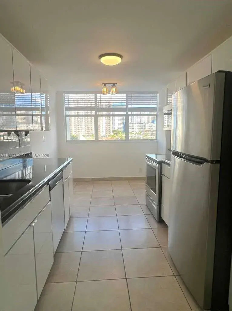 100 Golden Isles Dr # 406, Hallandale Beach FL 33009
