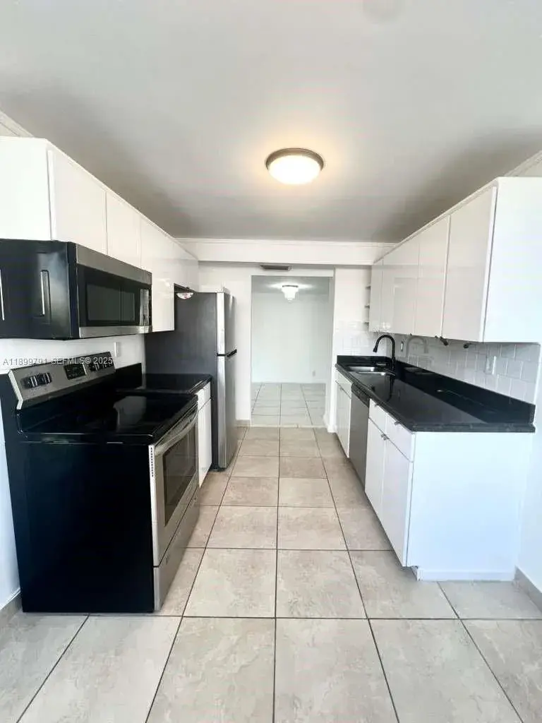 100 Golden Isles Dr # 406, Hallandale Beach FL 33009