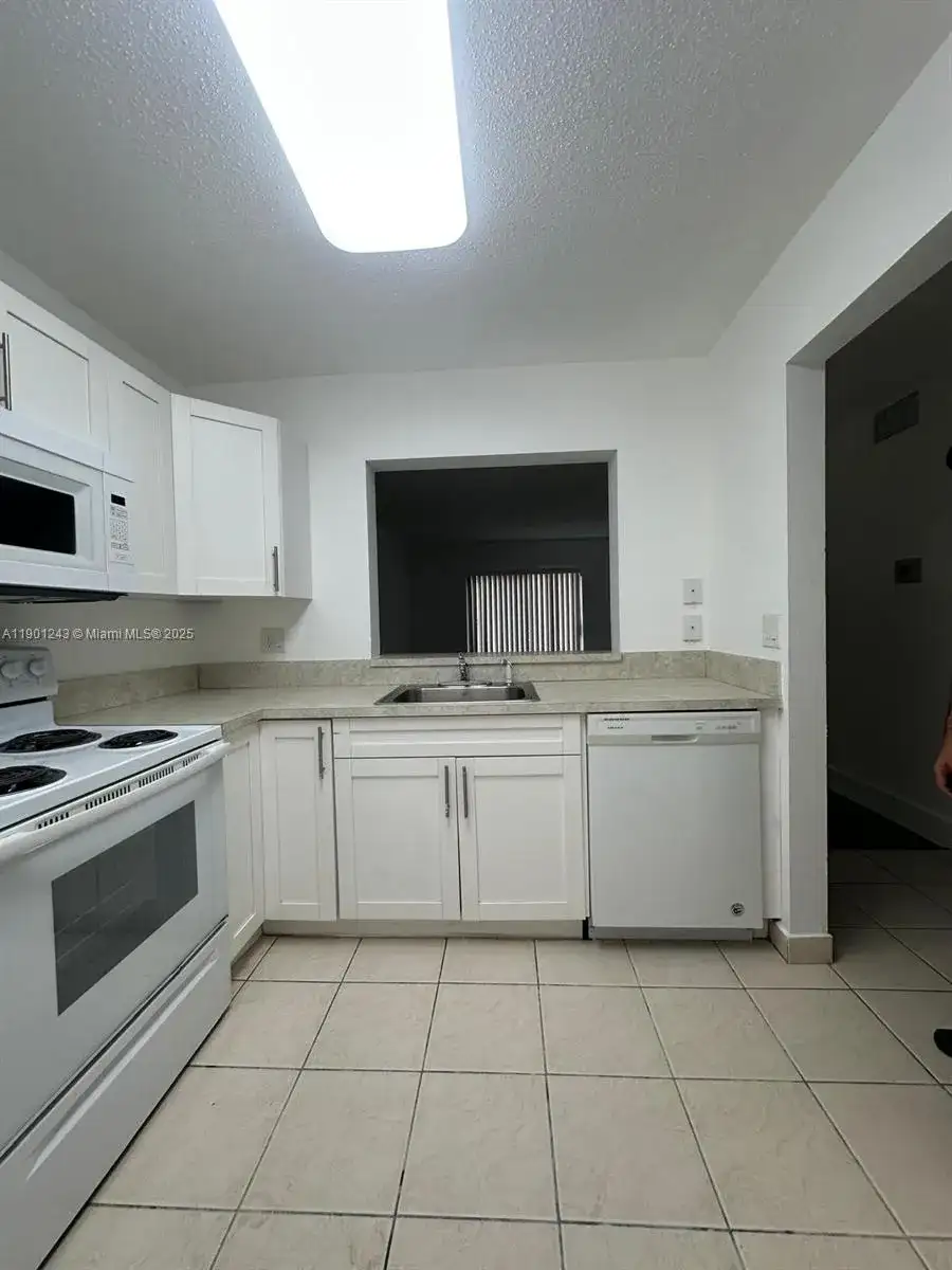 18101 NW 68th Ave # E210, Hialeah FL 33015 photo 3