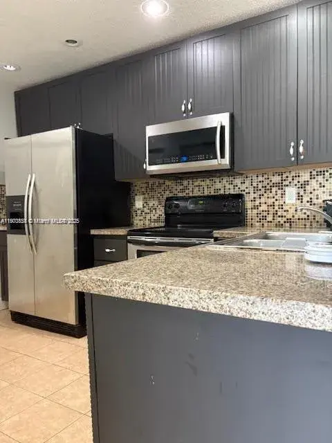 5721 Riverside Dr, Coral Springs FL 33067