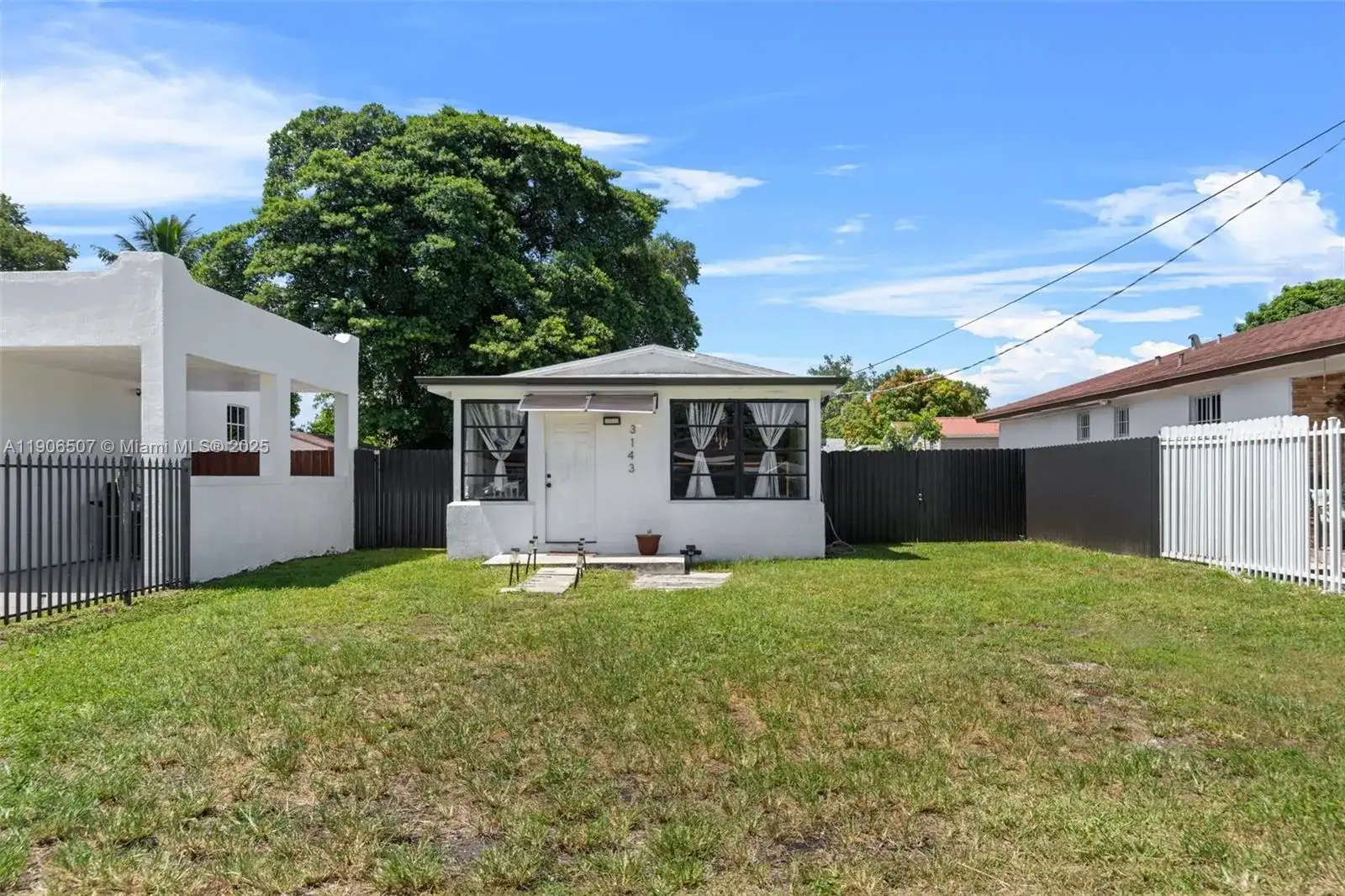 3143 NW 59th St, Miami FL 33142 photo 2