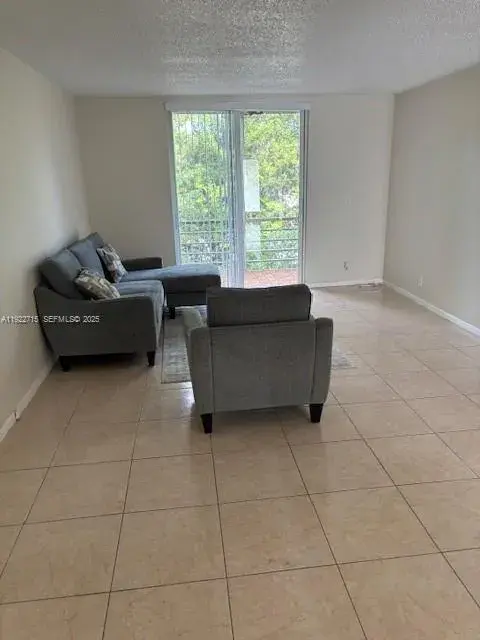 11651 Royal Palm Blvd # 207, Coral Springs FL 33065