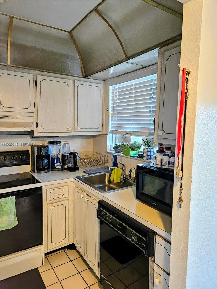 2701 N Pine Island Rd # 303, Sunrise FL 33322