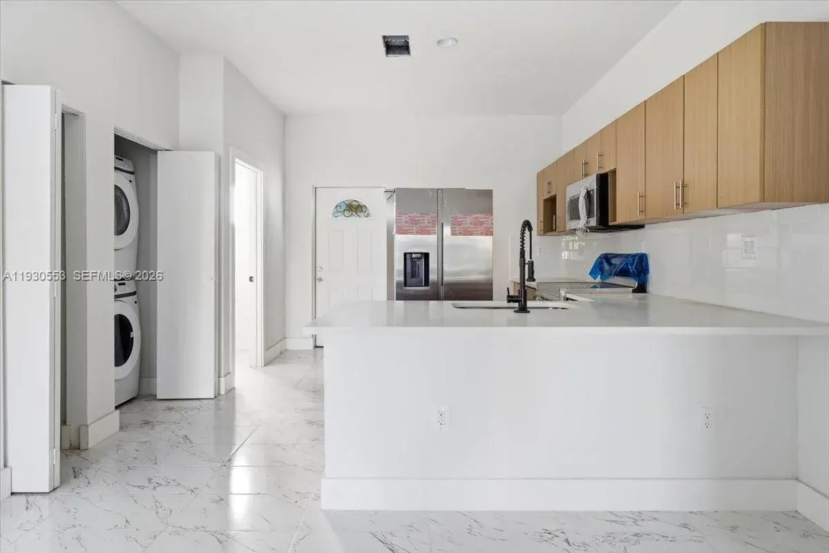 1126 NW 28 # 1126, Miami FL 33127
