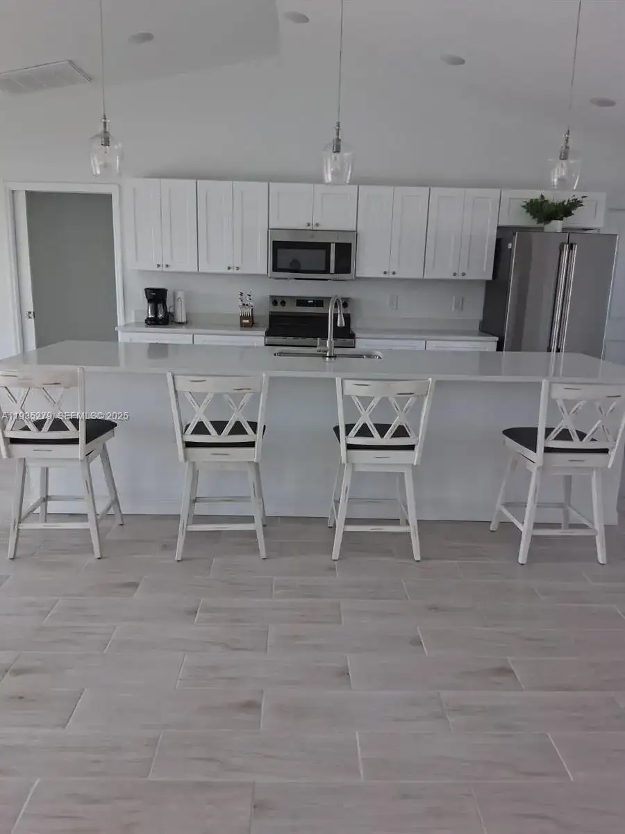 1828 NW 30th Ter, Cape Coral FL 33993 photo 3