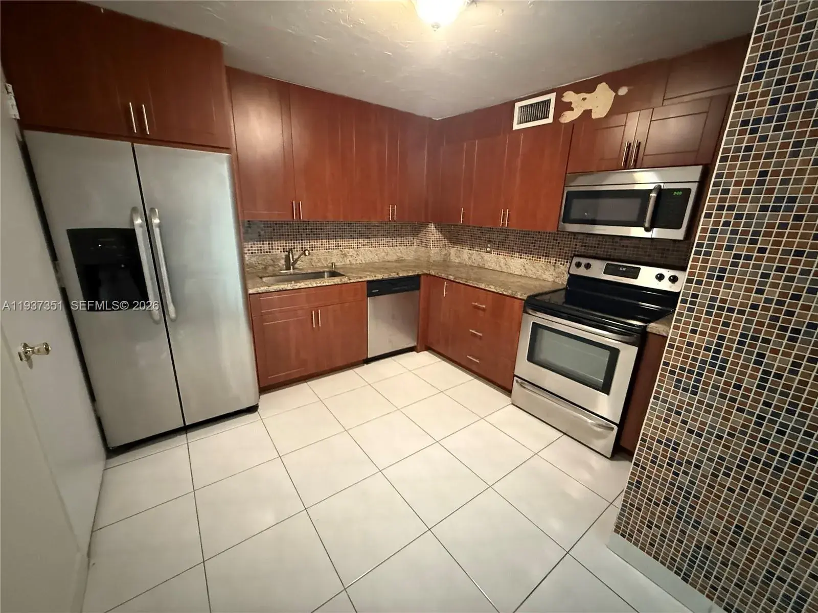 401 Golden Isles Dr # 202, Hallandale Beach FL 33009