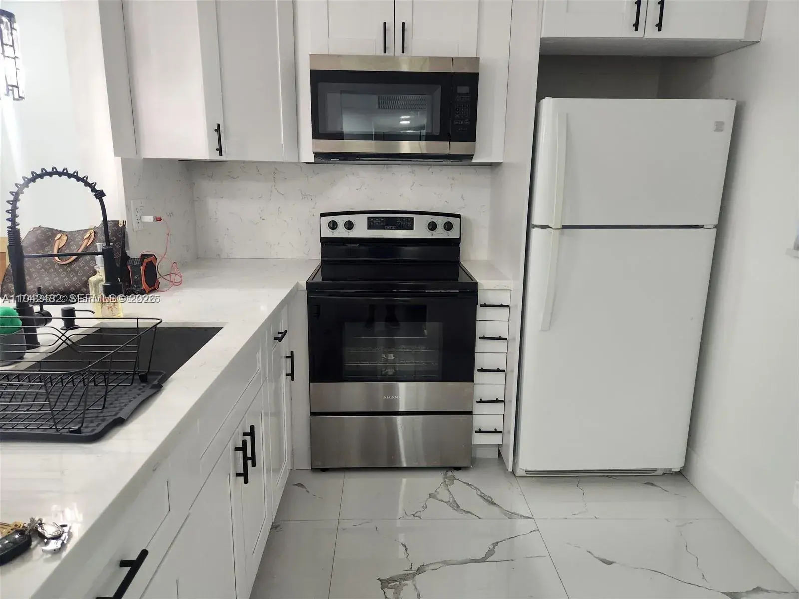 5001 NW 34th St # 305, Lauderdale Lakes FL 33319