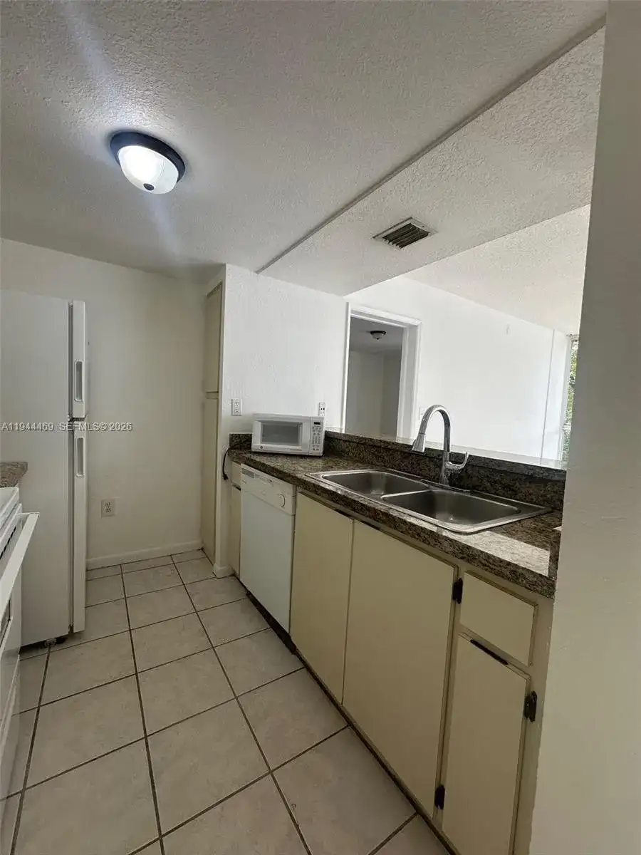 7125 NW 186th St # B208, Hialeah FL 33015 photo 2