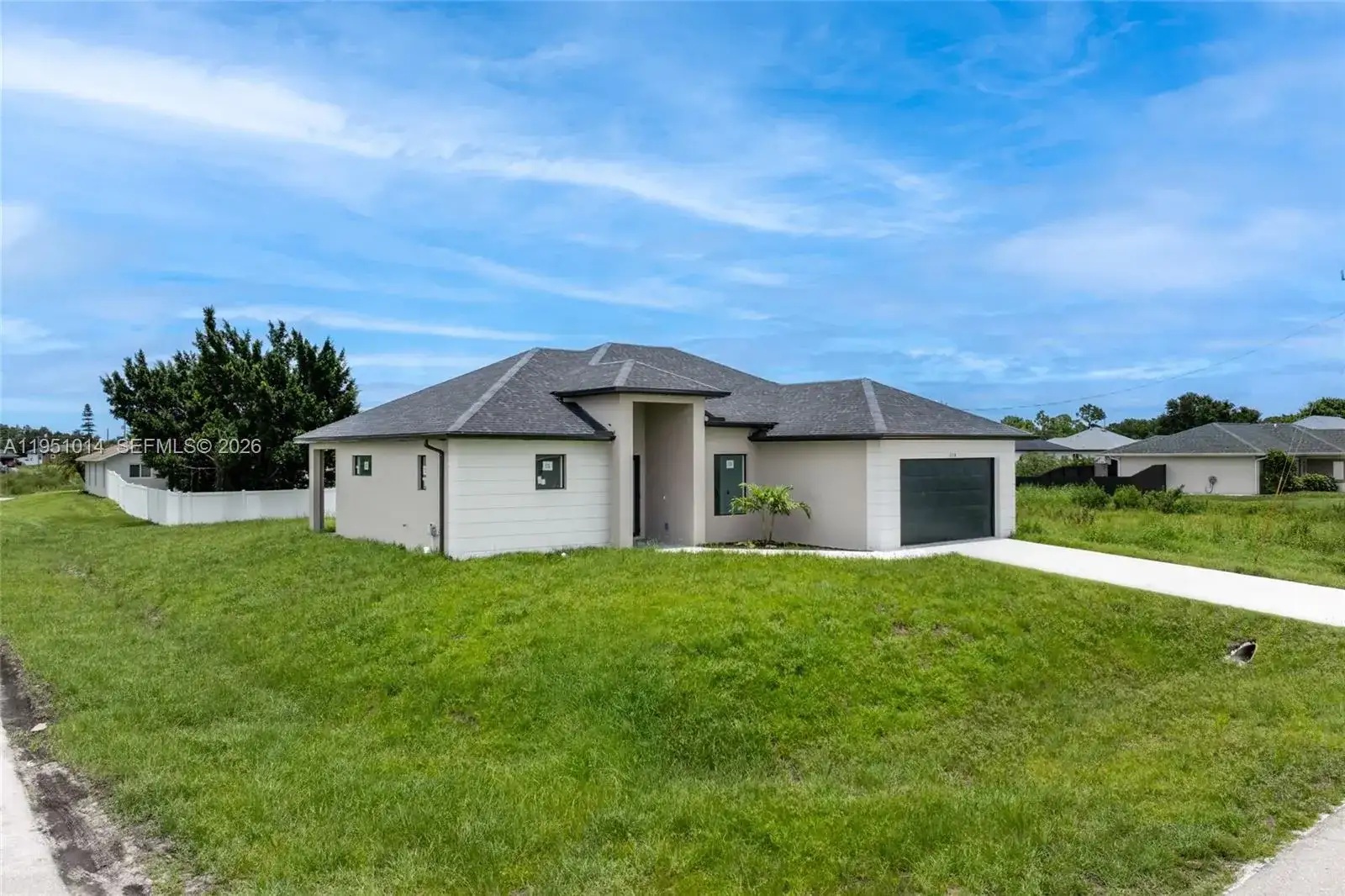 3318 30th St SW, Lehigh Acres FL 33976 photo 2