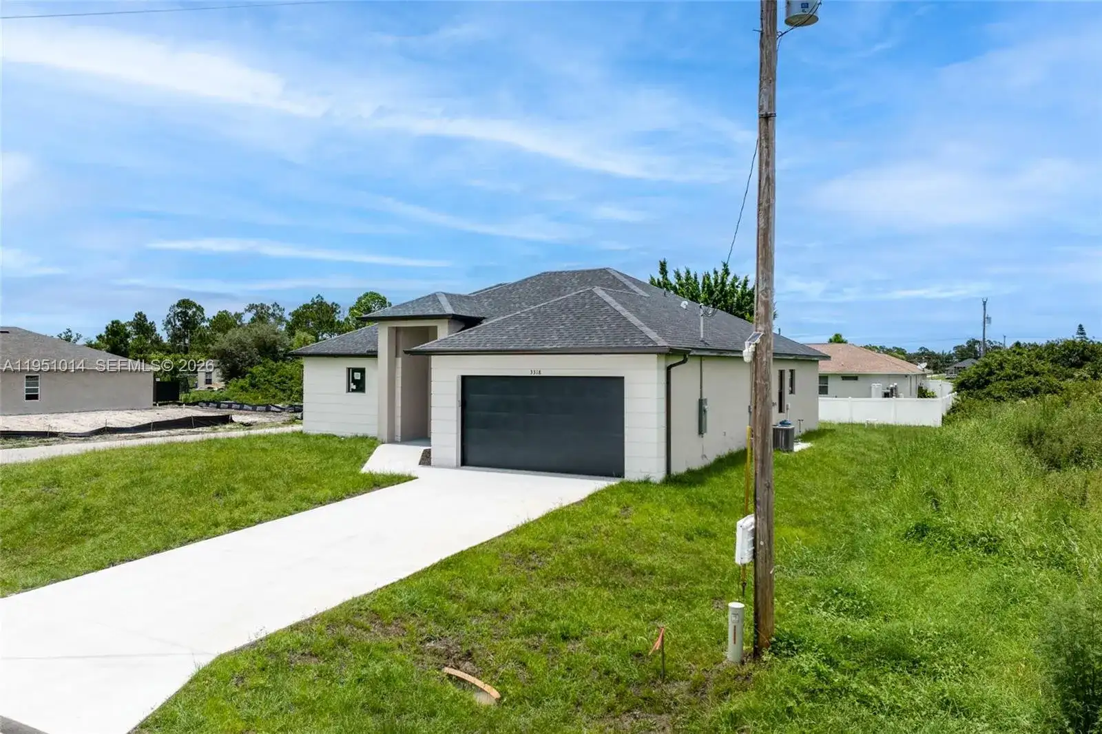 3318 30th St SW, Lehigh Acres FL 33976 photo 3