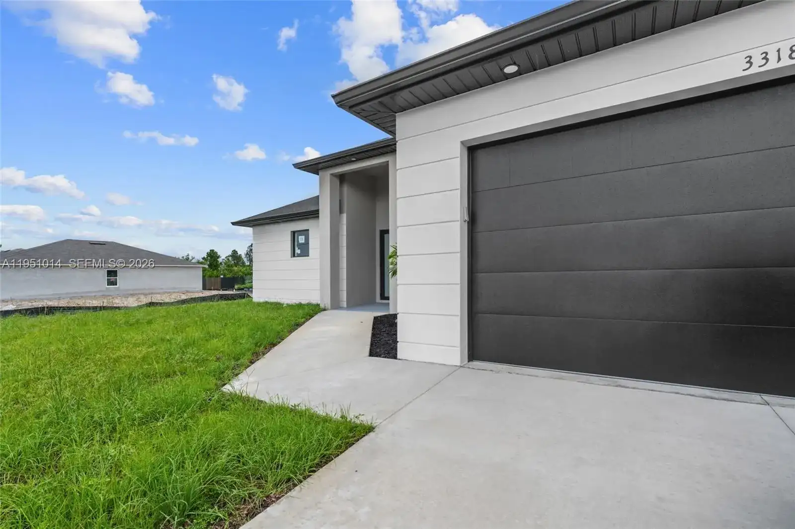 3318 30th St SW, Lehigh Acres FL 33976 photo 5