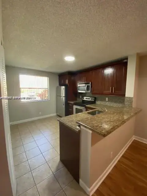 5841 Riverside Dr, Coral Springs FL 33067