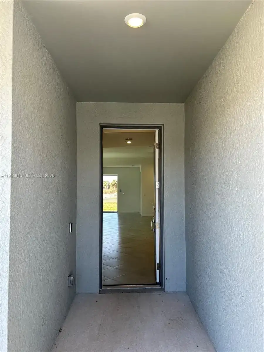 20483 Copperhead DR, Lehigh Acres FL 33936 photo 2