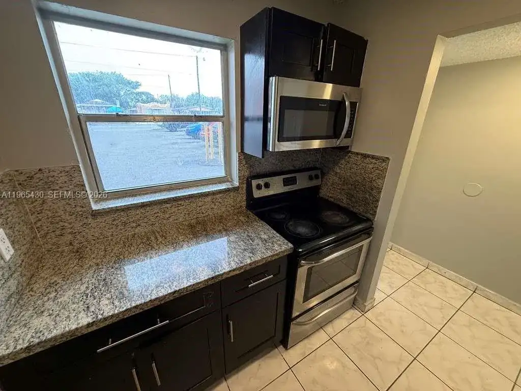 2721 NW 23rd Ct # 4, Miami FL 33142 photo 3