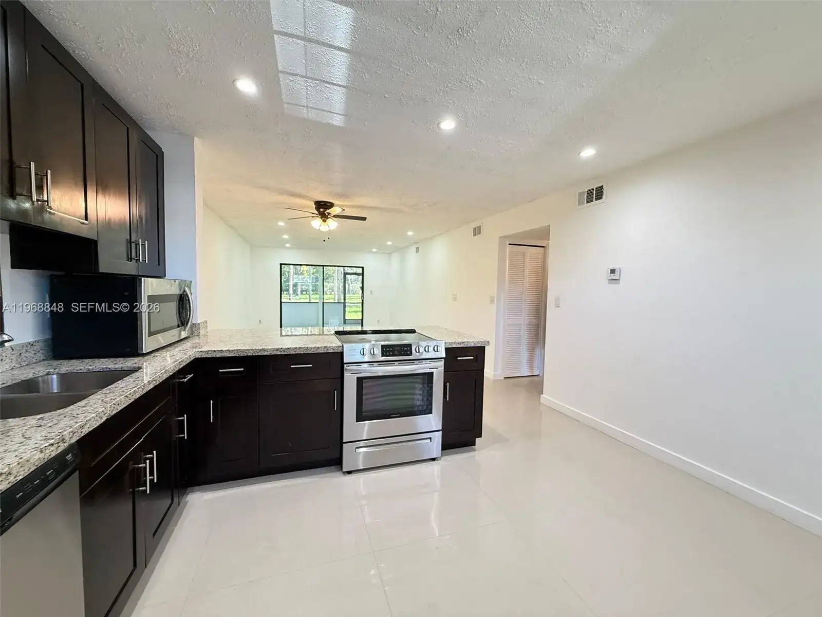 6095 N Sabal Palm Blvd # 103, Tamarac FL 33319 photo 2