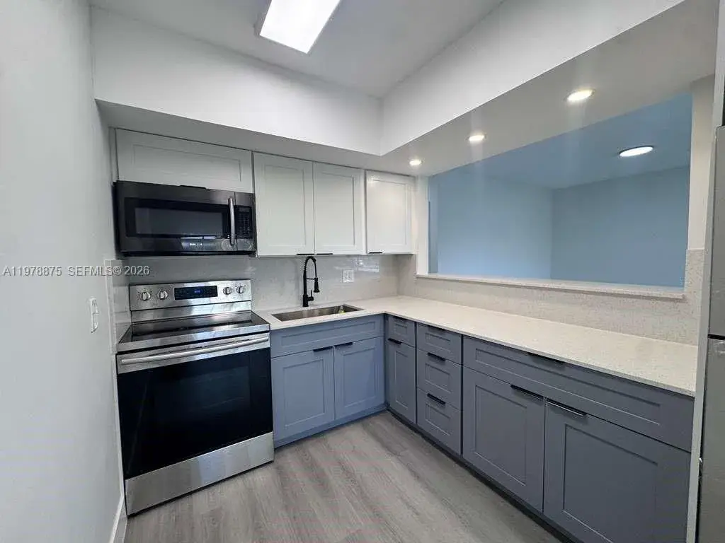 455 Golden Isles Dr # 203, Hallandale Beach FL 33009