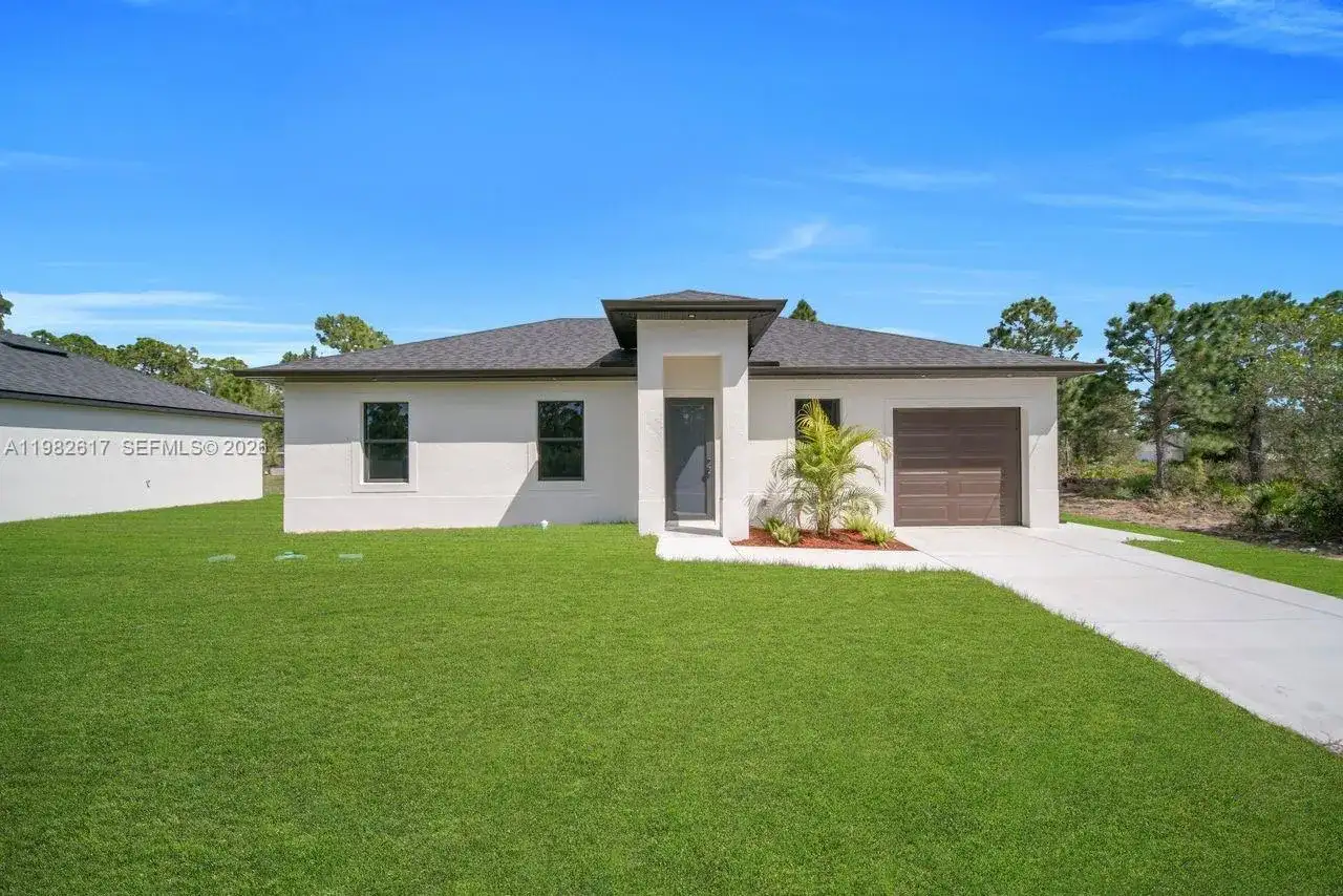 637 Summit Ave S, Lehigh Acres FL 33974 photo 2