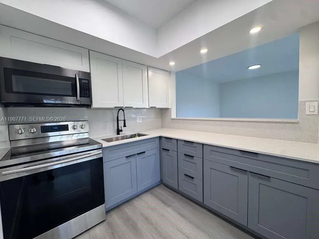 455 Golden Isles Dr # 203, Hallandale Beach FL 33009