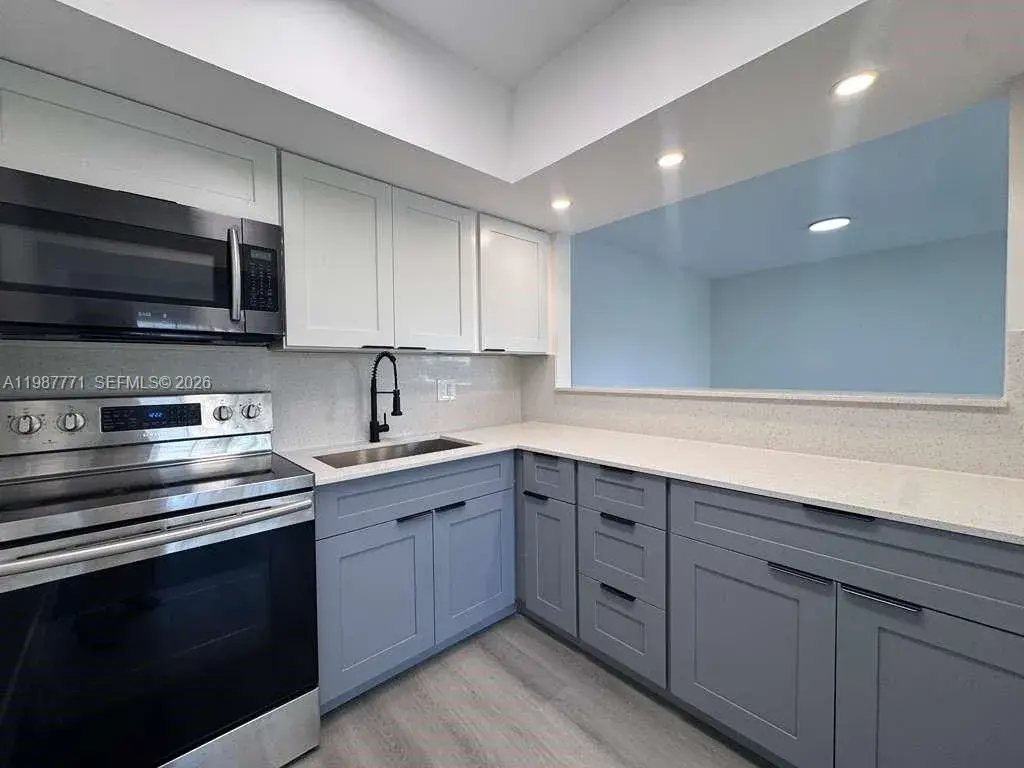 455 Golden Isles Dr # 203, Hallandale Beach FL 33009