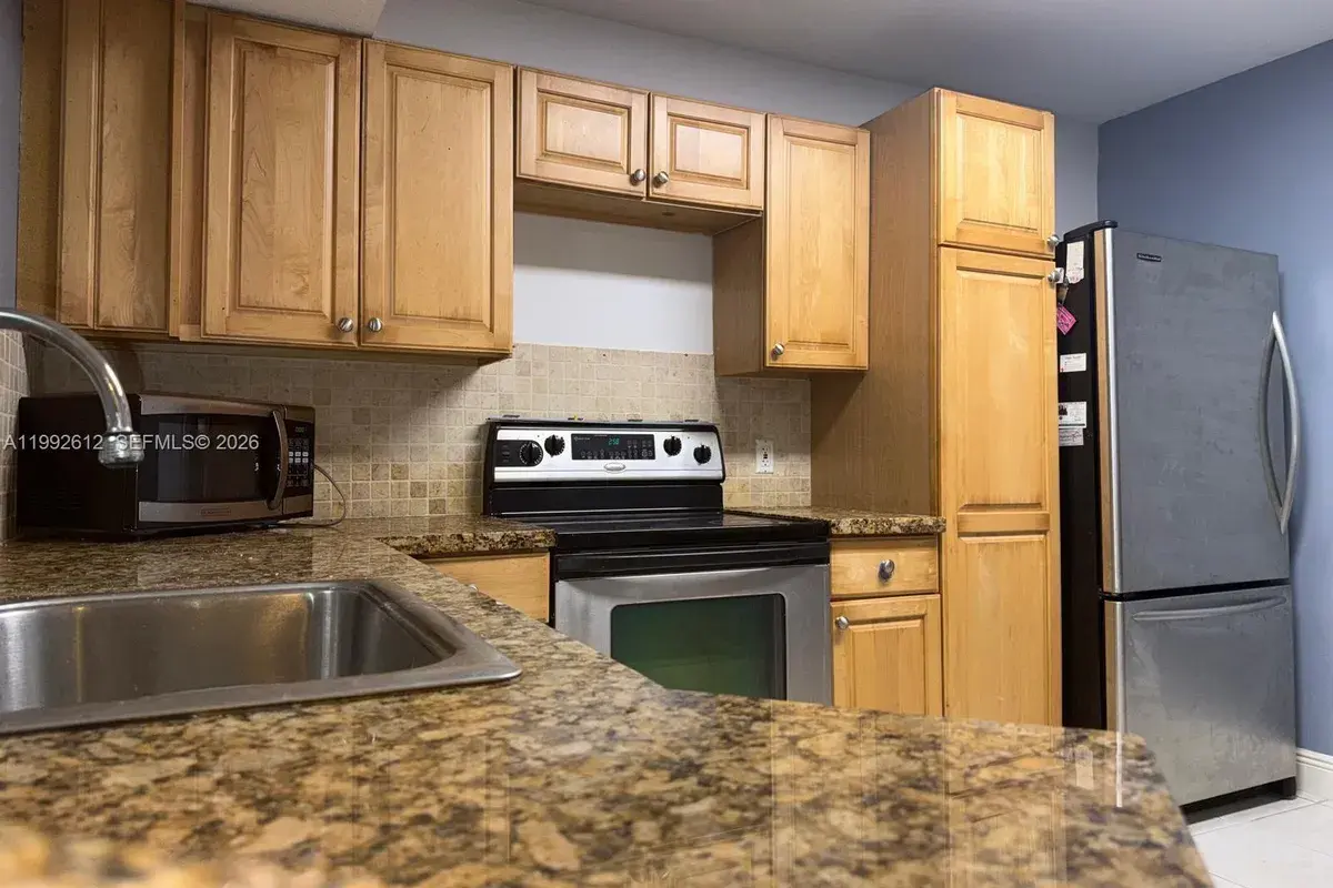 8901 Wiles Rd # 103, Coral Springs FL 33067
