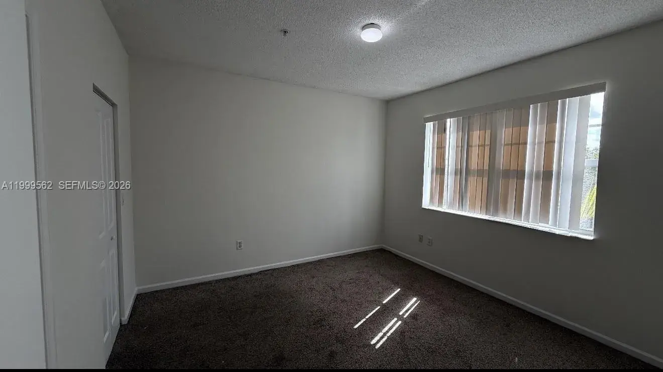 5800 W Sample Rd # 307, Coral Springs FL 33067