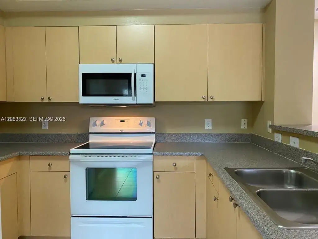 8060 N Nob Hill Rd # 203, Tamarac FL 33321 photo 2