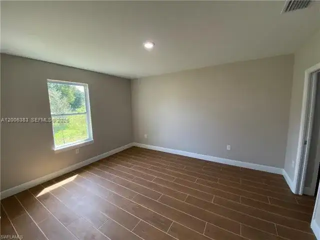 117-119 Meadow, Lehigh Acres FL 33973 photo 3