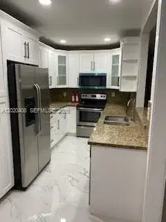 1311 NE 210th Ter # A, Miami FL 33179 photo 2